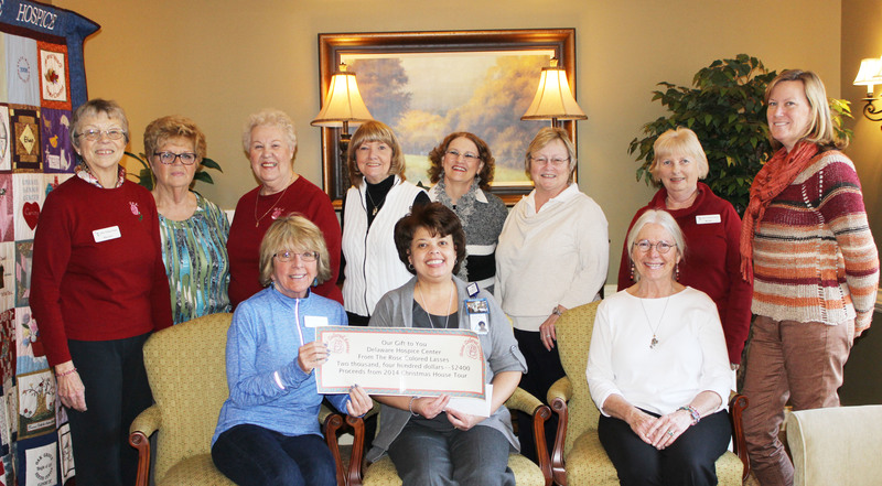 The Rose Colored Lasses held a Christmas House Tour to raise money for the Delaware Hospice Center in Milford. Shown in back are (l-r) Harriet Davies; Dee Greenlee; June Allen; Judy Woofter; Linda Potter, Delaware Hospice medical office manager; Sharon Brown; Becky Sharp, and Peggy Dolby, Delaware Hospice assistant director of development. In front are Rosi Babel; Debbie Taylor, clinical supervisor of inpatient services, and Norn Aquilani. Not pictured are Ginny Scott, Barb Richmond, Rose Nosher and Bobbi Lauer. SOURCE SUBMITTED